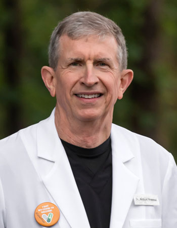 William E. Freeman, MD, with William E. Freeman MD Dermatology>